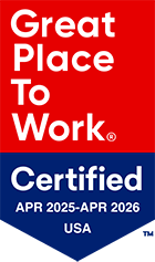 A badge reading "Great Place To Work Certified APR 2025–APR 2026 USA" in red, white, and blue colors.